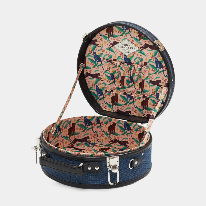 Open product view of the small hatbox Editor linen suitcase with navy body, black trims and cheetah print lining