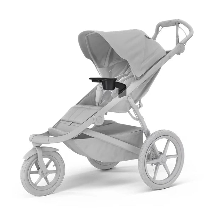 Gray Thule Urban Glide baby stroller with cup holder and Toshi Baby Romper shot