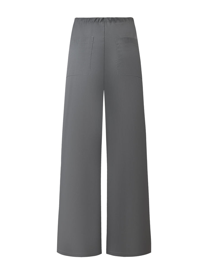 Back view of TIGERMIST's TYSHA PANT in charcoal, featuring a wide leg, elastic waistband, and two back patch pockets, displayed on a white background.