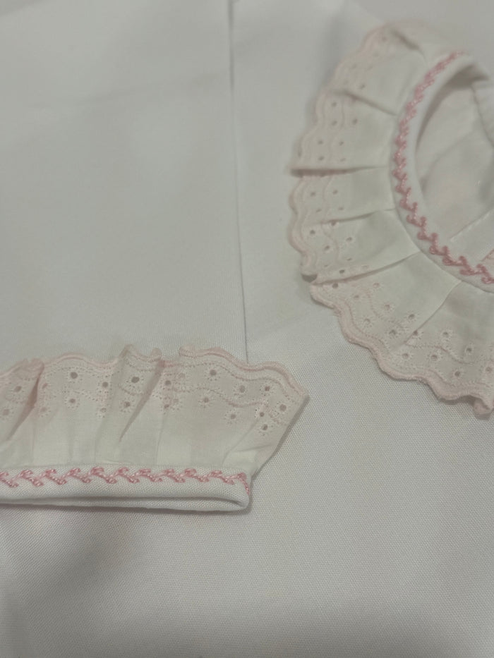 Close-up of pink embroidered ruffle trim on Wayne Shirt