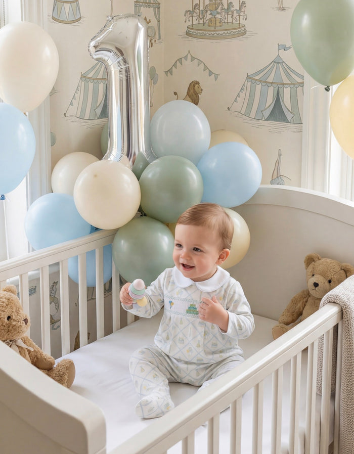 When He Wakes up He’ll be…. Birthday Boy Handsmocked Footie Babygrow