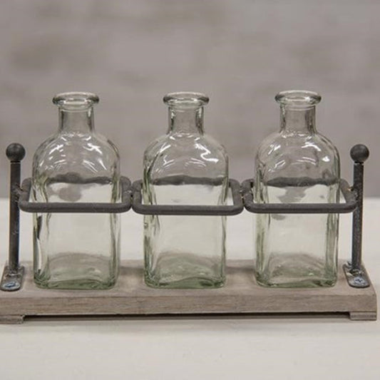 wood and iron bottle holder with vases