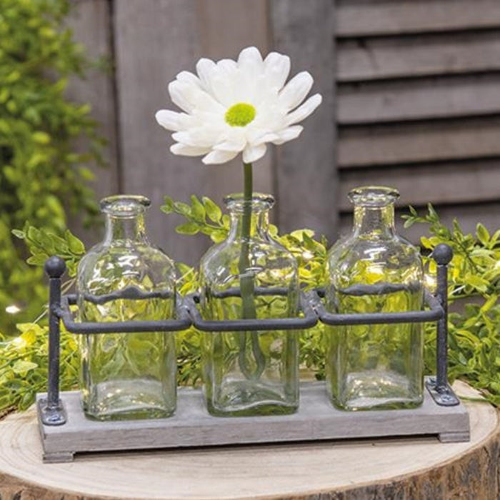 wood and iron bottle holder with vases