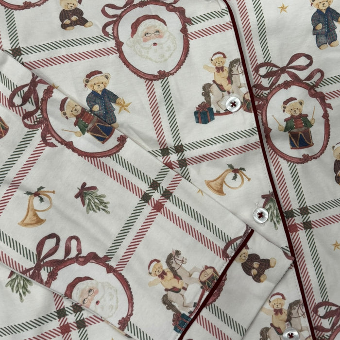 Close-up of Festive Bears plaid Christmas print with Santa and teddy bear details
