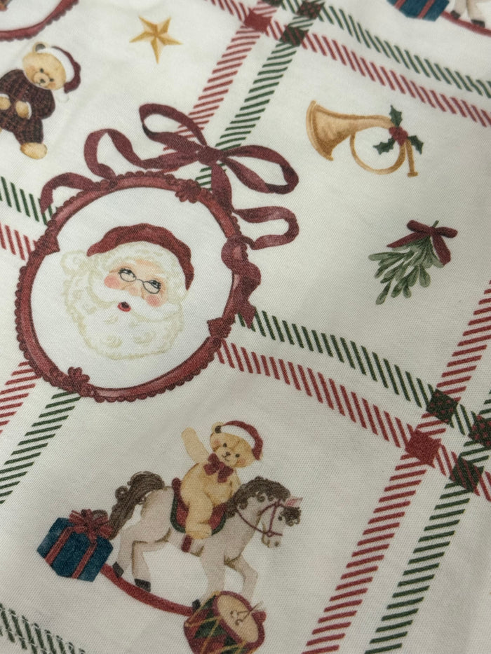 Close-up of Festive Bears Christmas print with Santa and teddy bear motifs